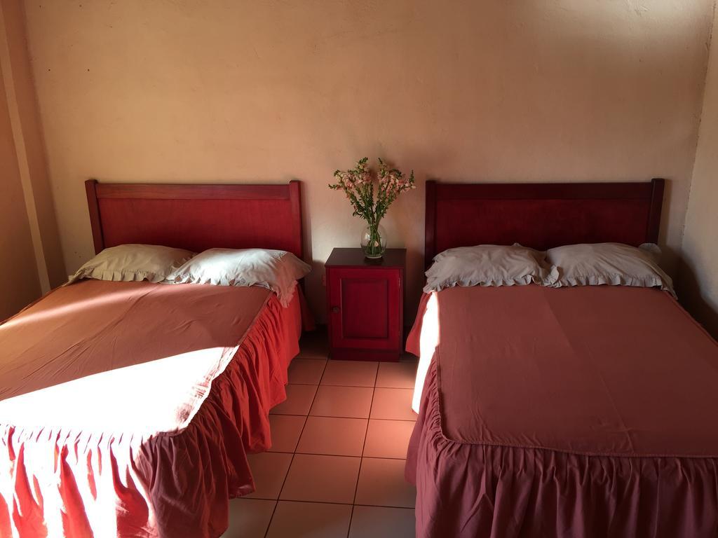 Hotel Villa Margarita Flores Pokoj fotografie